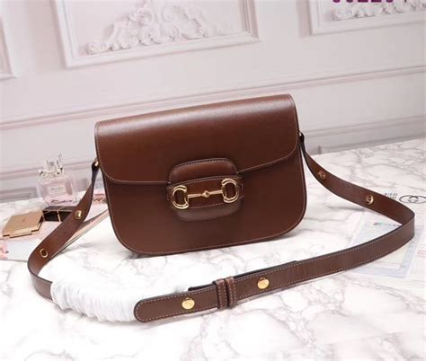 GUCCI Horsebit 1955 leather saddle bag .